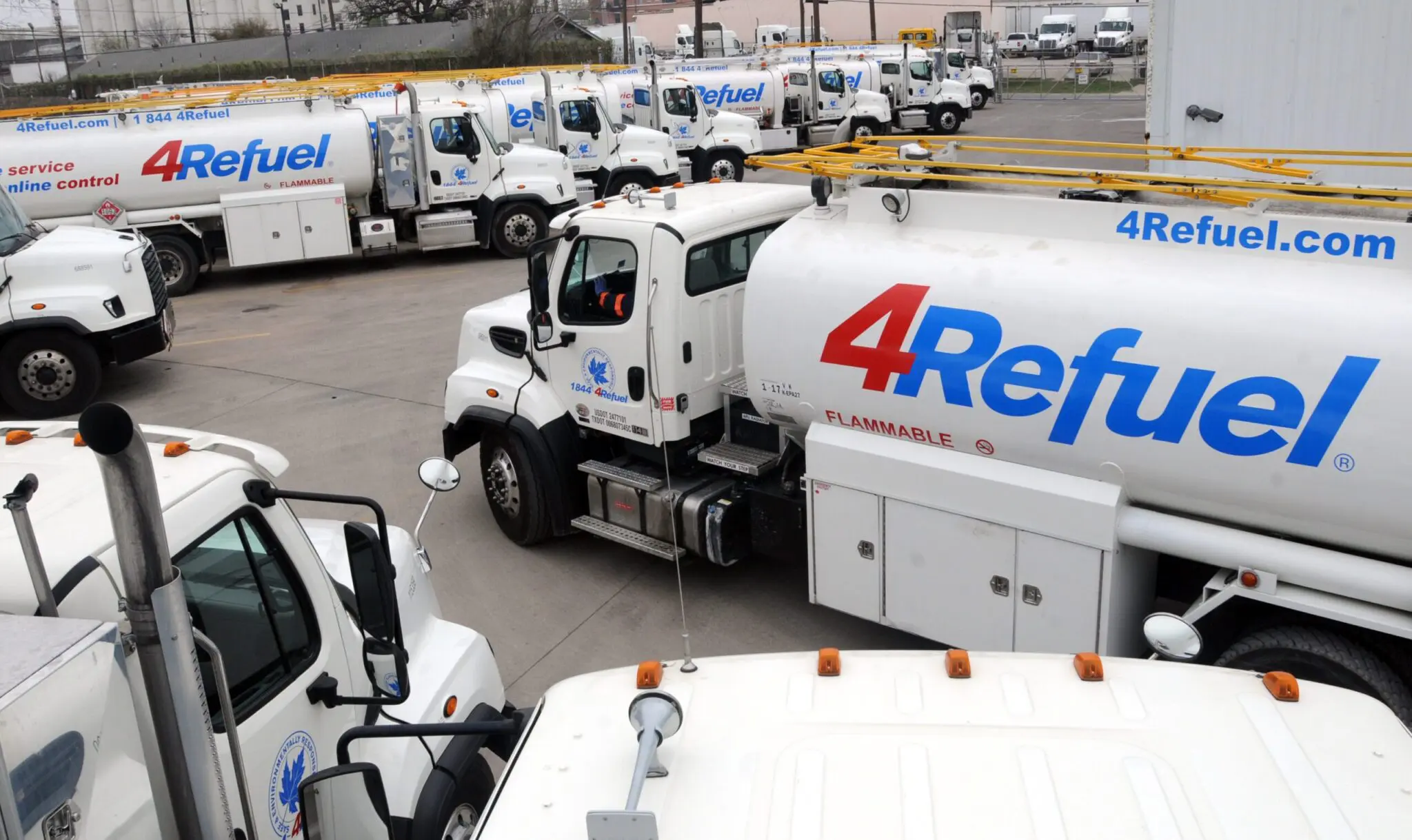 A yard full of 4Refuel fuel delivery trucks